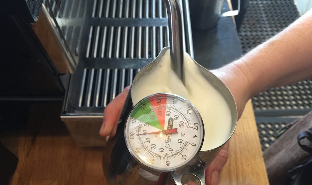 texturing milk with thermometer